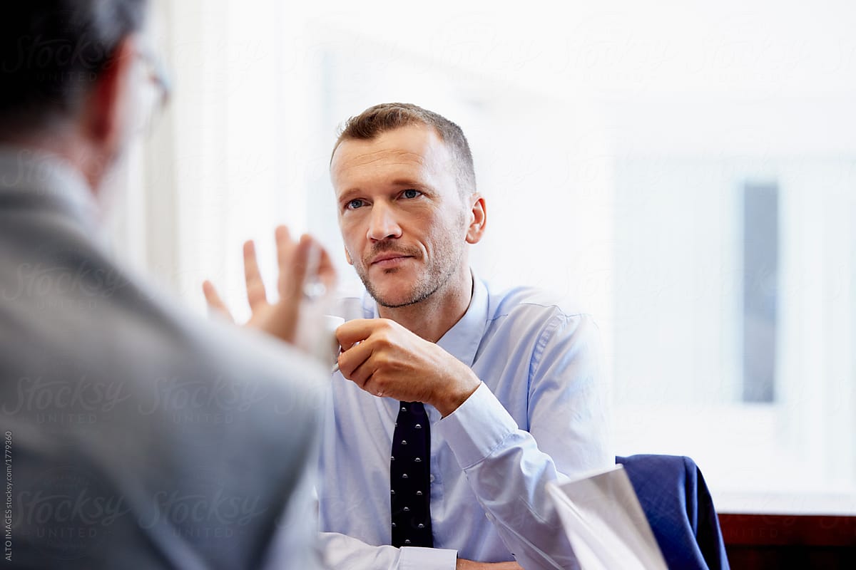 man-listening-intently-effective-communication-strategies